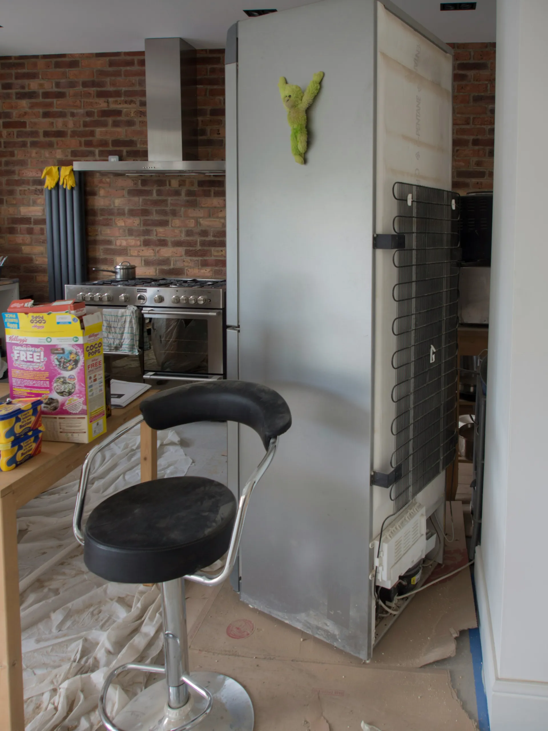 Abandoned kitchen with broken appliances
